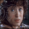 A character with curly brown hair and blue eyes appears in a of six , each showing slight variations in facial expression while wearing dark armor