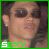 identical pixelated images showing a person with dark hair, sunglasses, and earrings against a green border with 'SEXY' text below