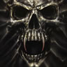 Static close-up of a metallic skull with sharp teeth and glowing red accents on the lower jaw, set against dark textured background.