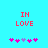 Pixelated text 'IN LOVE' in red above five pink and purple heart icons on a cyan background.