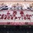 Pixelated static image showing a building facade with text reading 'Palace Theatre' in dark red letters on a light background.