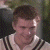 A pixelated image of a person in a striped shirt next to green text reading 'Original Icons .com' on a dark background.