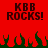 Red background with dark brown pixelated text 'KBB ROCKS!' repeated twice above green flame-like shapes.