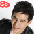 A pixelated image of a person with dark hair wearing a black jacket over a white shirt, with red text reading 'Go' and 'David!' above the head.