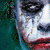 Four- of Joker character from The Dark Knight with distinct facial expressions and poses, each showing different angles and background elements