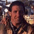 A pixelated image shows a person with dark hair and a checkered shirt against a blurred background, next to green text reading 'Original Icons .com' on a solid green field.