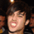 A pixelated image of a person with dark hair and a black choker on the left, next to pink background text reading "I luff Pete! <3".