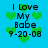 Blue background with green pixelated hearts and black text reading "I Love My Babe 9-20-08" in four repeated sections.