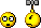Pixelated yellow emoji faces with black outlines and white eyes, some holding gray hammers against a light gray background.