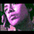 Four pixelated show a person's face with varying color filters and expressions, arranged in two of two