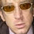 Animated contact sheet of a pixelated icon featuring repeated text and a small portrait, with visible frame-to-frame animation changes in the text.
