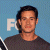 Pixelated image of a person with dark hair wearing a gray shirt against a light blue background, next to green text reading 'Original Icons .com' on a dark green backdrop.