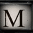 A single large black serif letter M centered on a light gray background with subtle gradient, framed by dark borders.