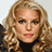 Pixelated image of a person with curly blonde hair and dark clothing on red background, accompanied by cyan text elements.