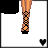 Pixel art of nine showing a female character with long brown-red hair, black hat, green eyes, and dark gray top; includes partial body views and text elements