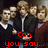 Group of people in dark jackets with white collars and brown accents, red pixelated text reading 'Can you say... AWESOME?!?' below.