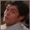 Pixelated image of a person with dark hair in a white shirt on left, adjacent to dark background with gray text reading PROUD ARA MEMBER on right.
