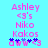 Pixelated text and symbols on a cyan background, with pink lettering for names and blue/pink symbols at the bottom.