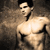 Pixelated static image of a shirtless male figure with dark hair and a black neck accessory against a muted brown background.