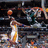 Pixelated image of a basketball player in mid-air shooting, with green text reading 'Brian Dawkins ...He Can Do It All' on the right.