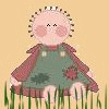 A cartoon doll with pink cheeks and a green dress sits in grass, surrounded by text reading "Klein Family Home Page" on a beige background.