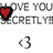 Pixelated text and symbols repeat across a white background with red heart icons appearing in different positions.