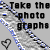 Pixelated image with text "Take the photo graphs" over diagonal striped pattern and heart symbol.