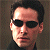 A 50x50 pixel buddy icon featuring a split composition with a person on the left and green text on the right, displayed as part of an animated contact sheet.