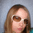 A pixelated image divided into four quadrants: top-left shows a person with light brown hair and white sunglasses, top-right is orange with green text "I LOVE KAYLA", bottom-left is green with yellow text "GO PACKERS", bottom-right is gray.