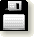 Pixelated black and white floppy disk icon with keyboard, showing multiple views including top-down, side, and partial perspectives.