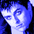 Pixelated blue and white icon of a stylized face with closed eyes, rendered in low-resolution digital art style.