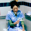 Woman in blue scrubs holding a pregnancy test with pixelated text overlay reading 'Pregnant Whore' in a clinical setting.