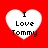 Four white heart-shaped icons on a red background, each containing the text "I Love Tommy" in black pixelated font.