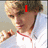 A person in a white jacket with red trim appears across four , text overlays change from 'I' to 'Love' to 'DANIEL!!!'