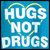 Blue background with white text reading HUGS NOT DRUGS and a yellow circular outline forming a heart shape around the text.