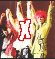 Animated sequence showing a red X logo with 'JAPAN' text, alternating between black-and-white and color versions of band members in performance poses.