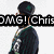 Pixelated image of a person in dark clothing with green accents, wearing a cap and multiple necklaces, shown from side to front view.