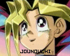 Animated close-up of a character with spiky blonde hair and large eyes, showing a tear on the left cheek, with text changing from 'JOUNOUCHI' to 'I LOVE YOU' below.