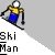 Pixelated character in yellow shirt and blue pants skis down slope with green tree and 'Ski Man' text visible.