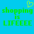 Pixelated green text on cyan background with yellow heart symbol above, displaying 'shopping is LIFEeee' in two identical side-by-side arrangements.
