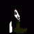 Pixelated icon shows a candle with green base and white flame against black background, next to white text reading 'trapped in the dark' on white square.