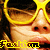 Pixelated close-up of a person wearing large yellow sunglasses with dark lenses, showing nose and mouth area.