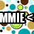 Pixelated graphic with large white text 'MMIE' on black background surrounded by scattered colored circles in blue, green, brown, and yellow tones.
