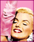 A four- shows a woman in pink attire with changing facial expressions and pose against a solid pink background
