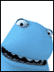 Blue cartoon character with large eyes and black teeth in four sequential poses showing head movement.