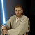 Static pixelated image of a character in light-colored robes holding a blue lightsaber against dark background.