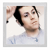 A person in a light blue shirt with a silver necklace appears in three showing facial expressions and head movements