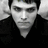 Black-and-white pixelated image of a person with hands behind head, text "Think" top-right and "Happy Thoughts!!" bottom-center.