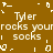 Pixelated text repeats 'Tyler rocks your socks' in white on a brown background with scattered white symbols.
