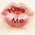 Two side-by-side animated frames of a cartoon mouth with text "Kiss Me" on pink lips against a light background.
